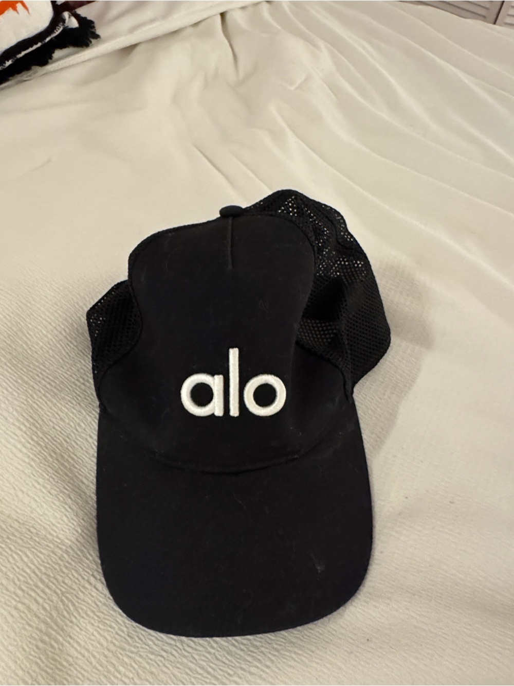 ALO Yoga Black Trucker Hat with White Logo